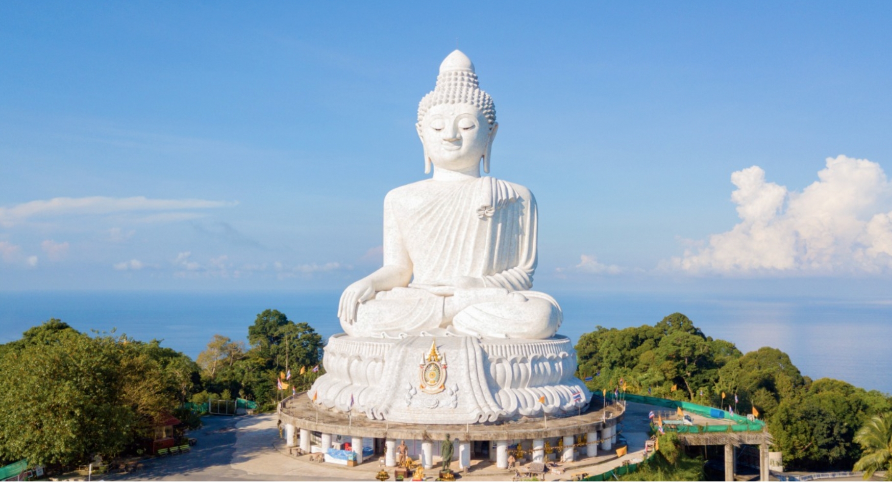 Buddha image with ocean back drop.